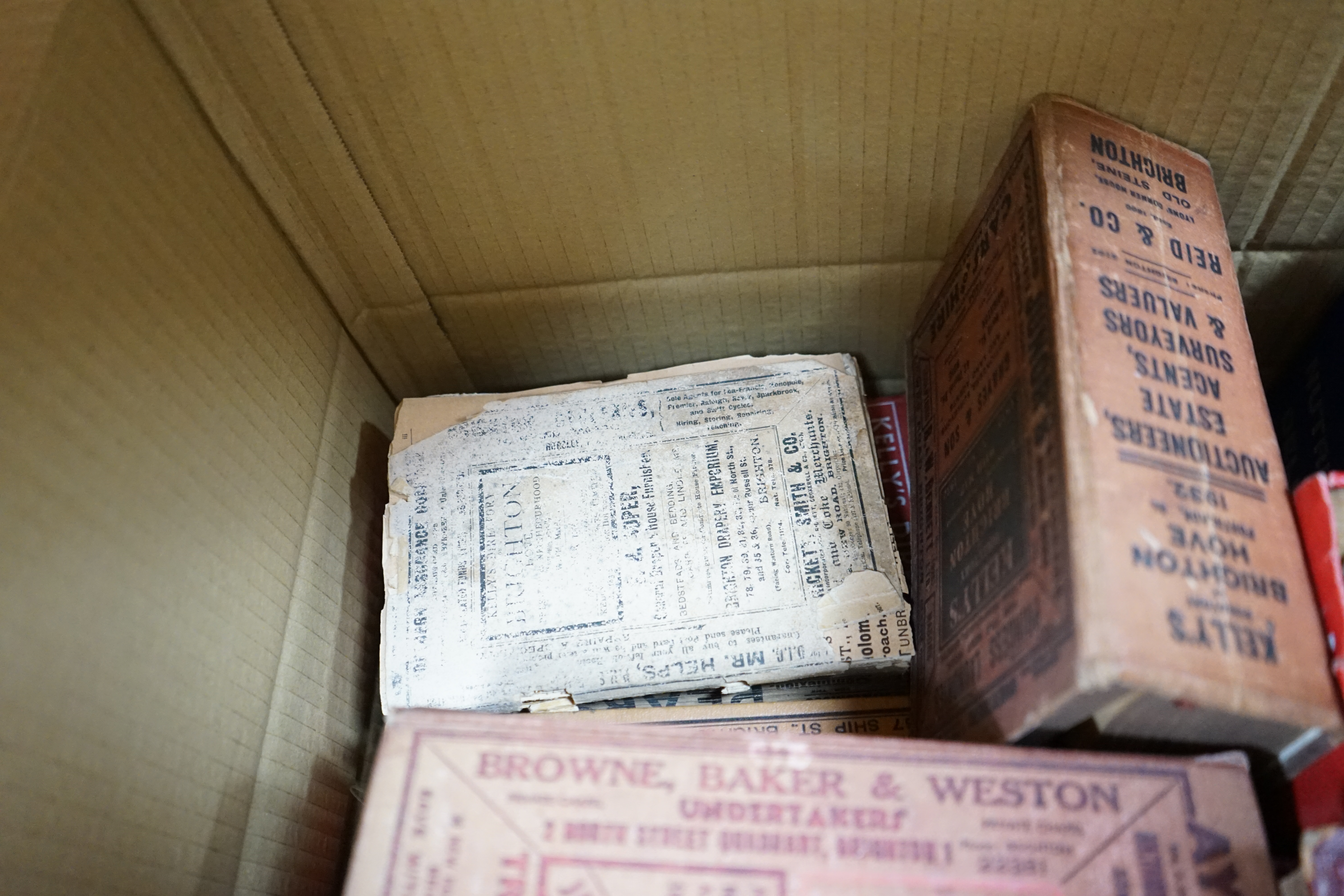 A collection of Brighton Directories, 1856 onwards (one box). Condition - poor to fair, some bindings loose and covers detached or faded